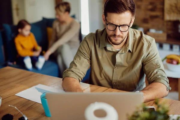 Mid Adult Father Using Laptop While Working Home His Family — Foto de Stock