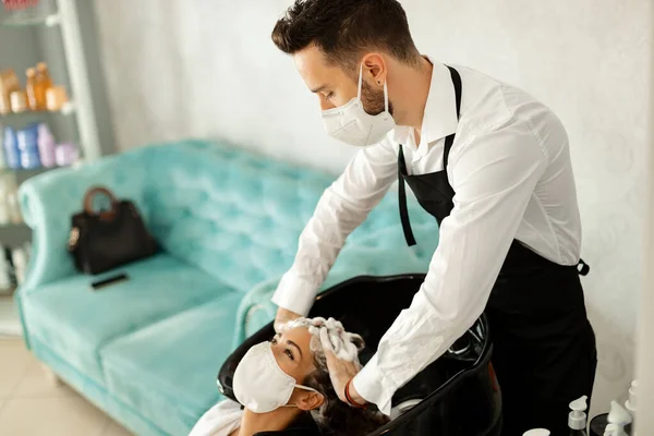 Hair Stylist His Customer Wearing Protective Face Masks Hair Wash — Zdjęcie stockowe