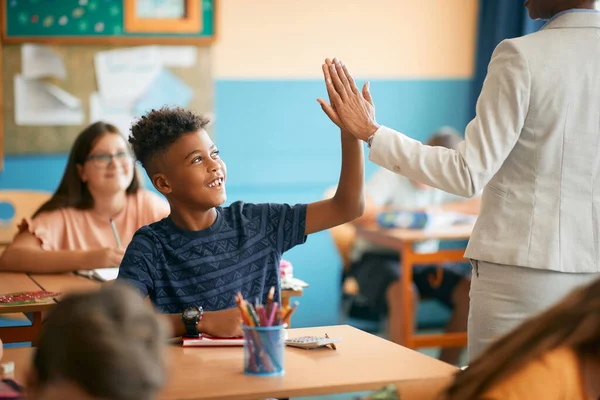 Happy African American Schoolboy Giving High Five His Teacher Class — Stock Fotó