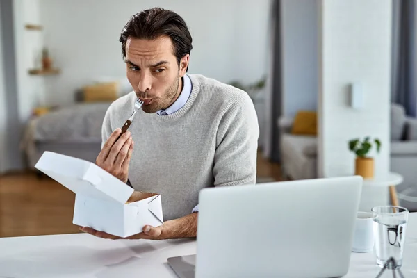 Young Freelance Worker Having Meal While Working Computer Home — Photo