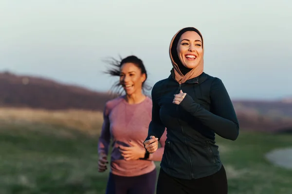 Young Happy Athletic Woman Her Fitness Instructor Running Together Nature —  Fotos de Stock