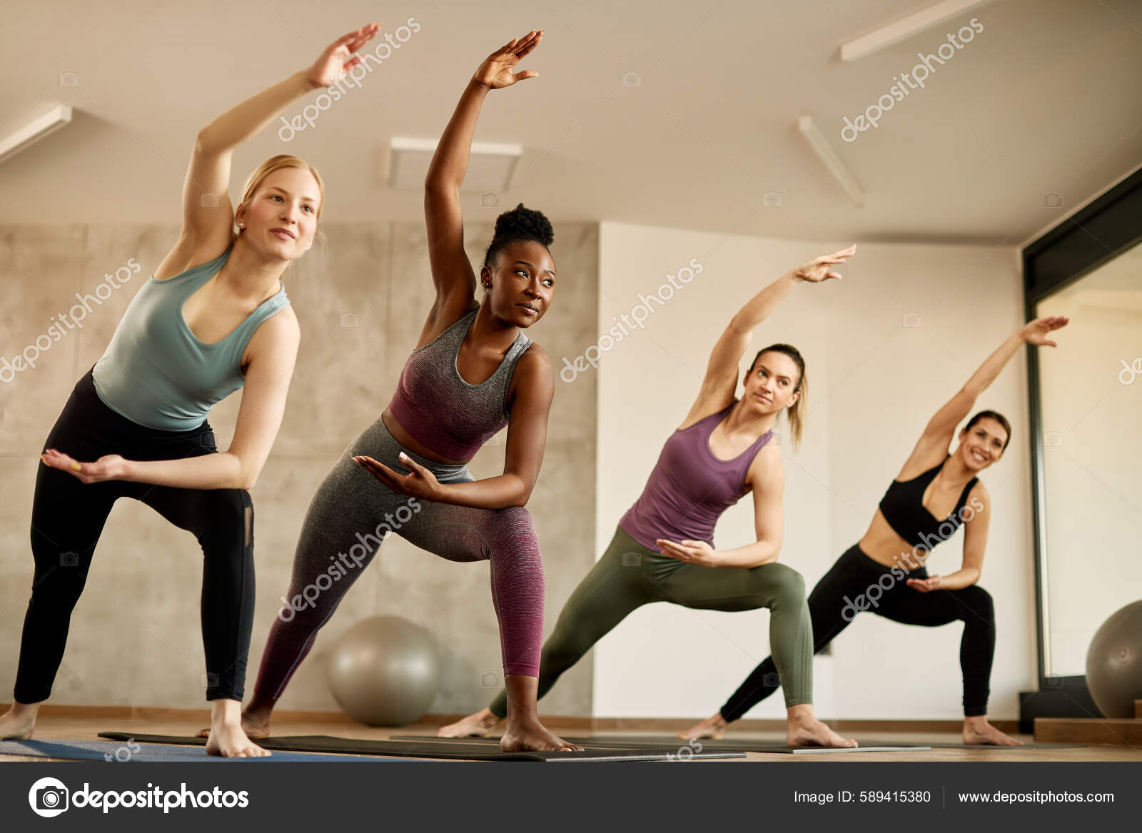 Group Diverse Athletic Women Doing Stretching Exercise Sports