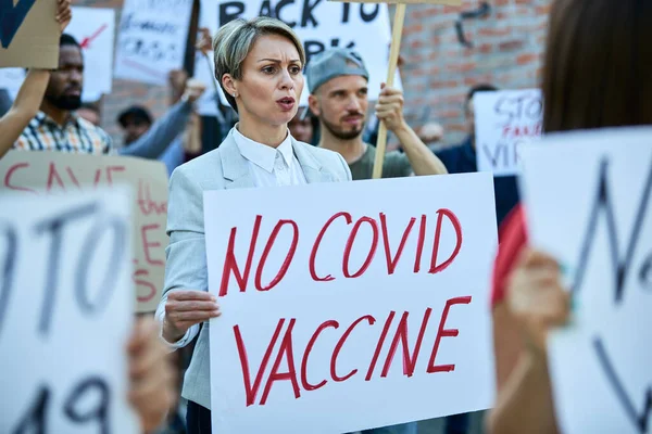Caucasian Woman Carrying Banner Covid Vaccine Inscription While Participating Crowd — Foto de Stock