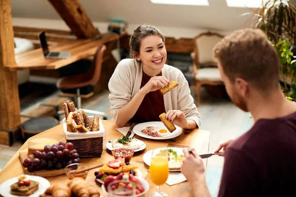 Happy Couple Eating Breakfast Talking Dining Table Morning Focus Woman — 스톡 사진