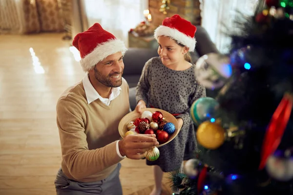 Happy Little Girl Her Father Decorating Christmas Tree Ornaments Home — ストック写真