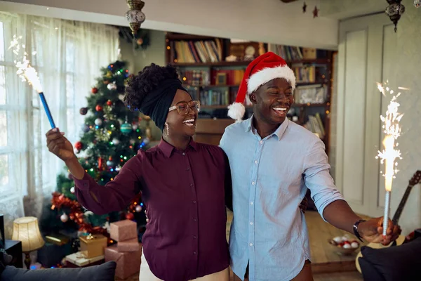 Young African American Couple Celebrating Christmas Having Fun Flaming Torches — ストック写真