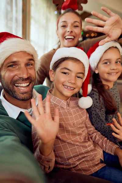 Cheerful Family Waving While Making Selfie Christmas Looking Camera — ストック写真