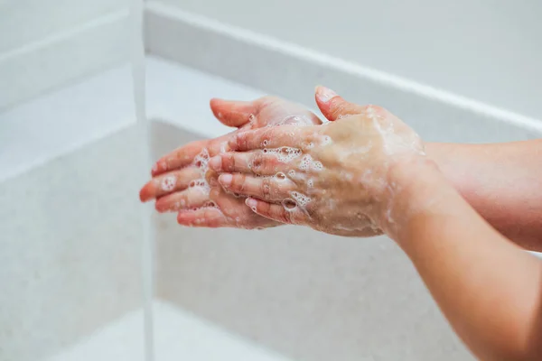 Close Woman Rubbing Hands Soap Bathroom Sink — Stockfoto