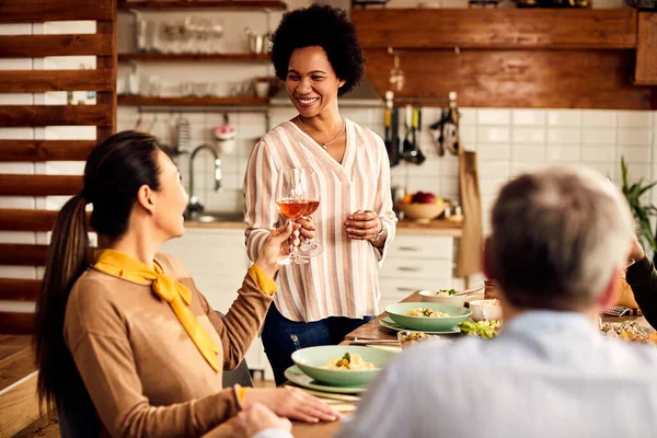 Happy Black Woman Her Friends Toasting Wine Meal Dining Room — Foto de Stock