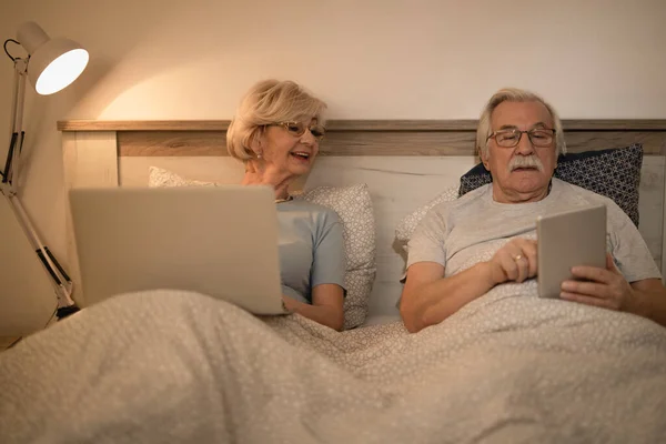 Happy Mature Woman Using Laptop While Her Husband Surfing Net — Photo