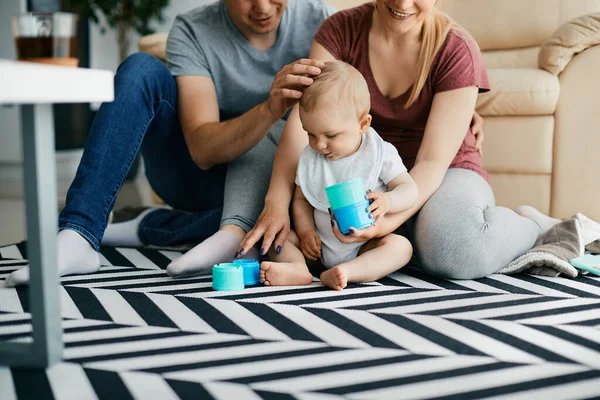 Cute Baby Boy Playing Toys While Sitting Floor His Parents — Stock Fotó