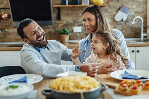 Young Happy Parents Having Fun Small Daughter Lunch Dining Table — стоковое фото