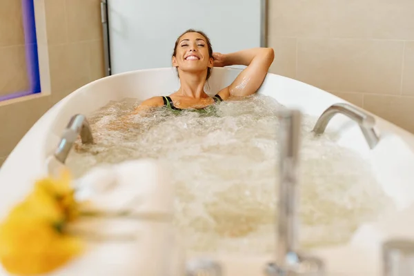 Happy Woman Relaxing Bathtub Hydrotherapy Health Spa — Stock Photo, Image