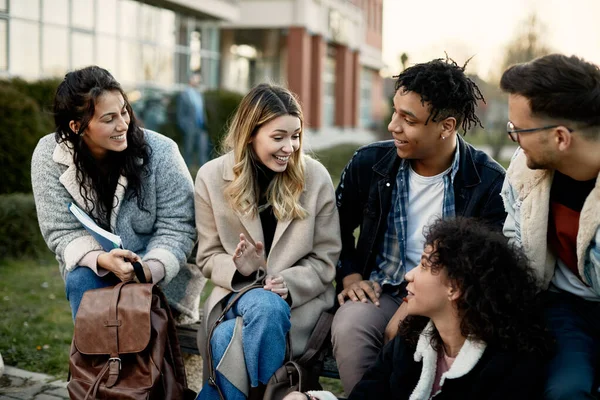 Group Happy Multi Ethnic Students Communicating While Sitting Outdoors Campus — Fotografia de Stock
