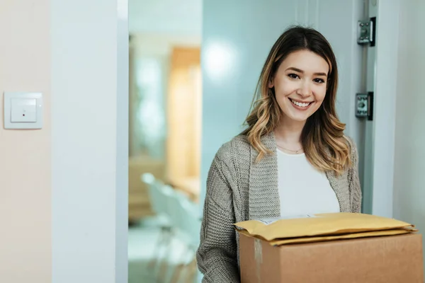 Satisfied Female Customer Holding Delivery Packages While Standing Doorway Looking — Stok Foto