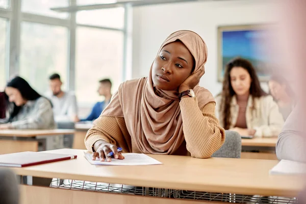 Pensive African Student Hijab Attending Class University Classroom — Fotografia de Stock