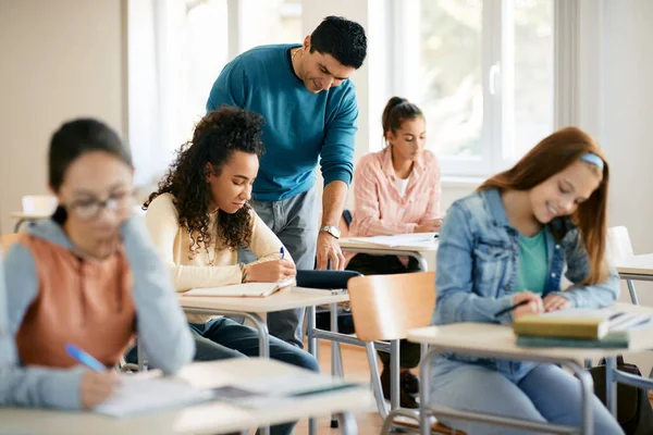 African American High School Student Leaning Teacher Help Classroom — Stok Foto