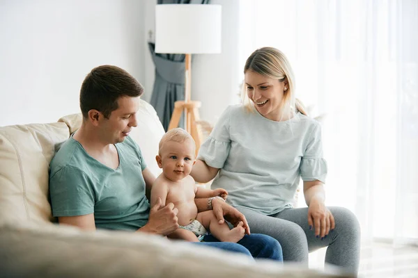 Cute Baby His Parents Relaxing Sofa While Enjoying Family Time — Stok Foto