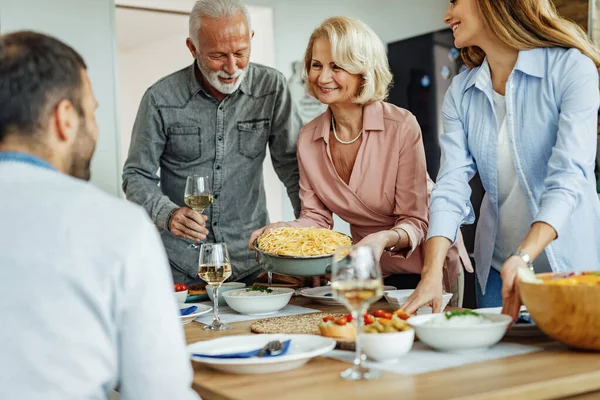 Happy Family Talking While Preparing Dining Table Lunch Focus Senior — Foto de Stock