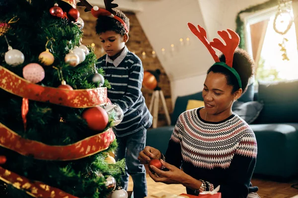 Happy African American Mother Her Small Son Decorating Christmas Tree — ストック写真