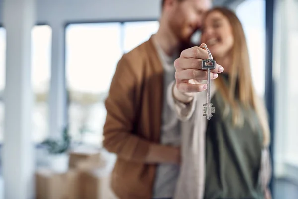 Close Happy Couple Holding Door Key While Buying First Home —  Fotos de Stock