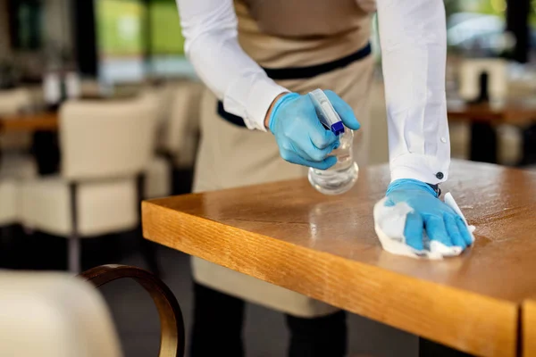 Close Waiter Spraying Cafe Tables Disinfectant Due Coronavirus Epidemic — 스톡 사진