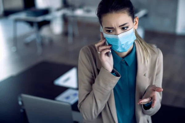 Displeased Businesswoman Making Phone Call While Working Office Coronavirus Pandemic — 스톡 사진