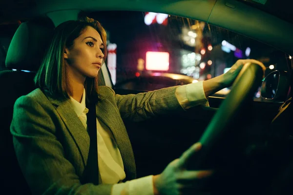 Young Woman Driving Car City Streets Night — Stockfoto