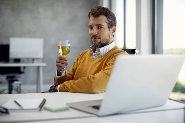 Mid Adult Businessman Having Video Chat Laptop Drinking Wine Call — Φωτογραφία Αρχείου
