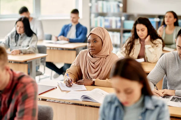 Female African American Student Hijab Writing Class University Classroom — Stockfoto