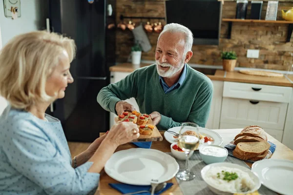Happy Senior Man His Wife Eating Dining Table Focus Man — Foto de Stock