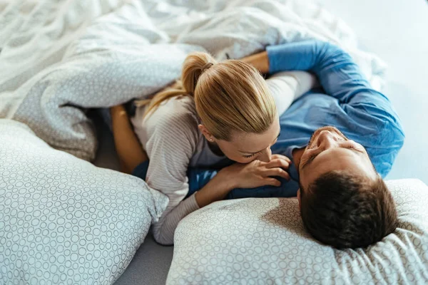 Affectionate Couple Embracing While Relaxing Bedroom Eyes Closed — Foto Stock