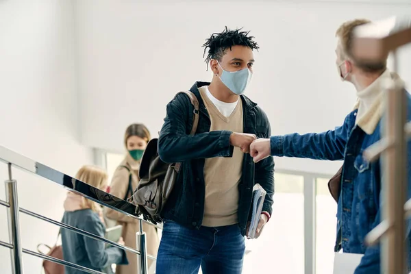 African American Student His Friend Fist Bumping While Greeting Hallway — Foto Stock