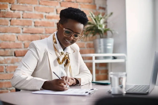 African American Female Ceo Taking Notes While Working Computer Office — Stock Fotó