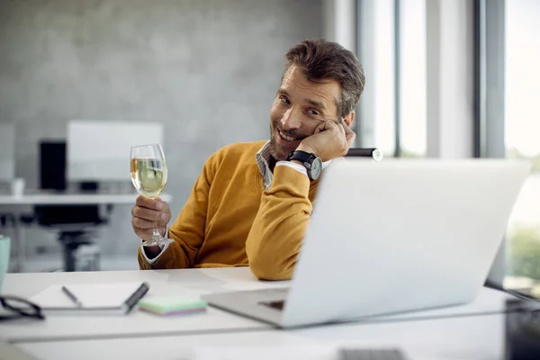 Happy Businessman Using Laptop Dating Online While Drinking Wine Office — Φωτογραφία Αρχείου