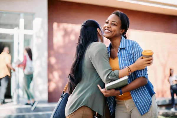 Happy African American Woman Greeting Her Female Friend While Going — Stok fotoğraf