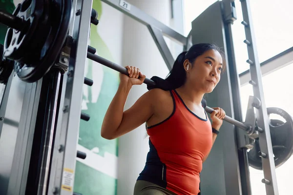 Low Angle View Asian Sportswoman Using Barbell While Doing Back — Stockfoto