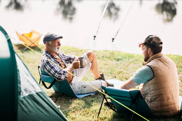 Senior Father His Son Enjoying Camping While Fishing Communicating Lake — ストック写真