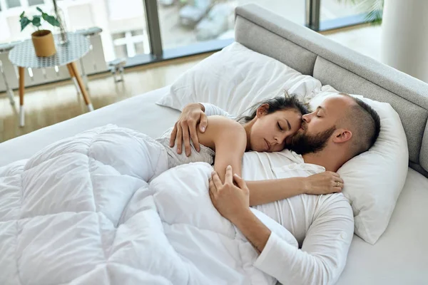 Young Couple Enjoying While Sleeping Embraced Bedroom — Foto Stock