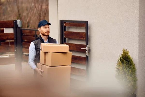 Male Courier Delivering Packages Customer Home Address Copy Space — Stockfoto