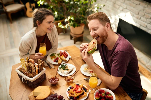 Happy Man Eating Sandwich Eyes Closed While Having Breakfast His —  Fotos de Stock