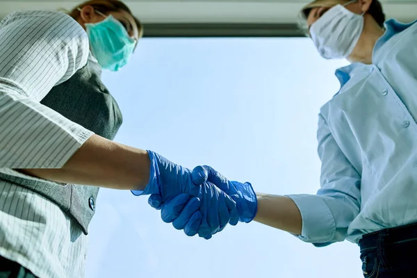 Close Businesswomen Shaking Hands While Wearing Protective Gloves Coronavirus Pandemic — 스톡 사진