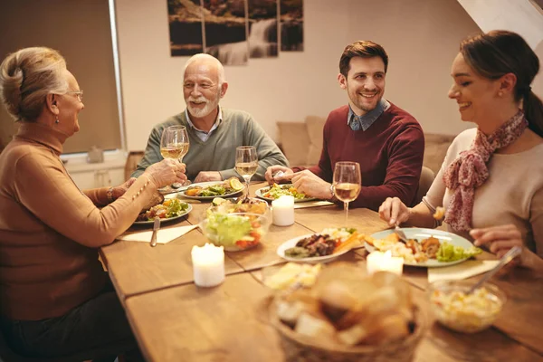 Happy Man Talking His Wife While His Parents Toasting Wine — Foto Stock