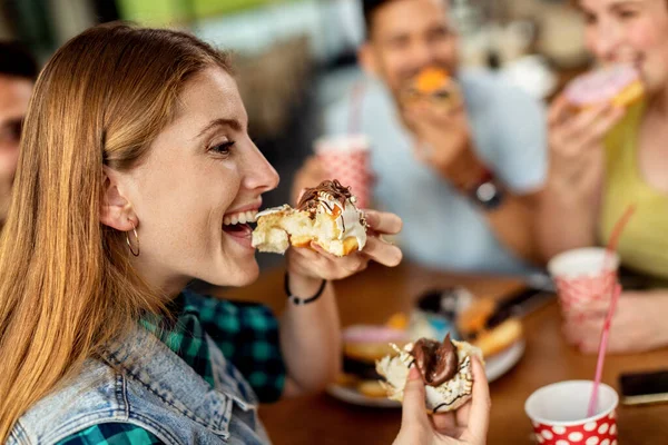 Young Happy Woman Enjoying While Eating Donuts Friends Cafe — Photo