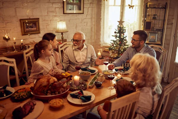 Happy Multi Generation Family Communicating While Having Dinner Christmas Home — Stock Photo, Image
