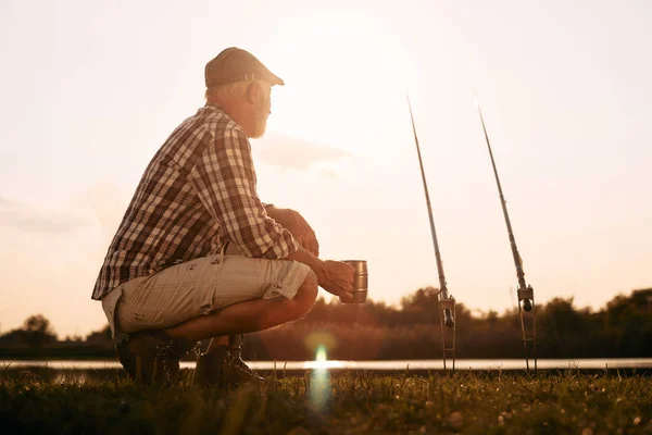 Low Angle View Mature Man Enjoying While Fishing Lake Sunset — 图库照片