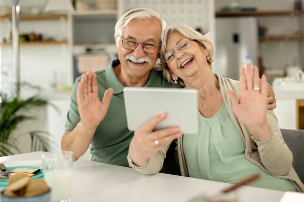 Happy Senior Couple Waving Having Fun While Making Video Call — Photo
