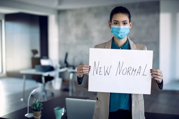 Businesswoman Protective Face Mask Holding Placard New Normal Inscription While — 스톡 사진
