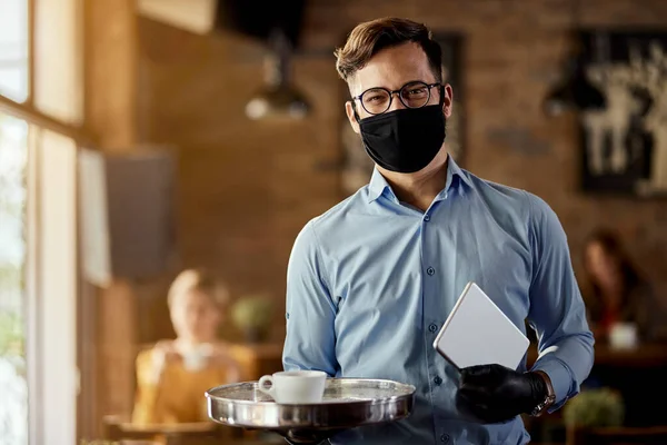Young Happy Waiter Wearing Protective Face Mask While Working Reopened — 스톡 사진