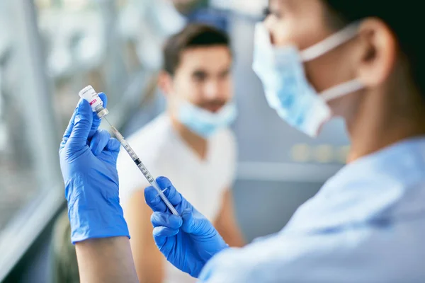 Close Nurse Preparing Covid Vaccine Male Patient Vaccination Center — 스톡 사진